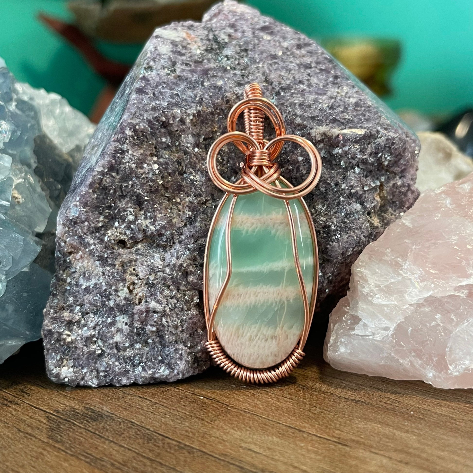 Green and white Amazonite wrapped in copper